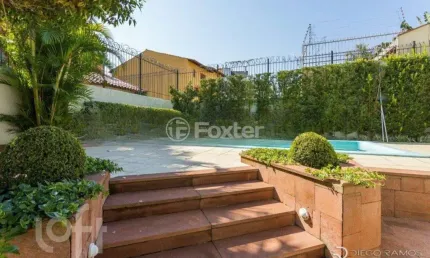 Casa com 4 quartos à venda na Rua Walir Zottis, 550, Jardim Itu Sabará, Porto Alegre, 293 m2 por R$ 1.070.000