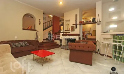 Casa com 4 quartos à venda na Rua Walir Zottis, 65, Jardim Itu Sabará, Porto Alegre, 400 m2 por R$ 1.140.000