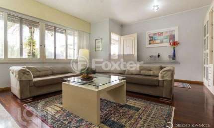Casa com 4 quartos à venda na Rua Pedro Waine, 194, Santa Maria Goretti, Porto Alegre, 244 m2 por R$ 834.900