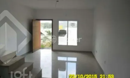 Casa com 3 quartos à venda na Avenida Vereador Roberto Landell de Moura, 328, Campo Novo, Porto Alegre, 101 m2 por R$ 345.000