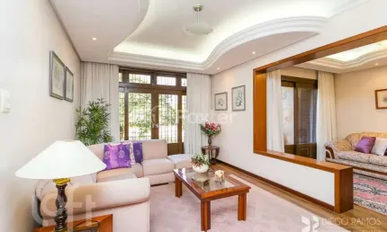 Casa com 4 quartos à venda na Rua Guadalajara, 85, Jardim Itu Sabará, Porto Alegre, 296 m2 por R$ 1.100.000