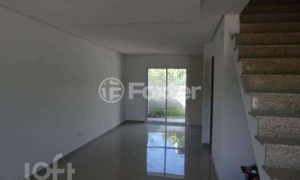 Casa com 3 quartos à venda na Rua Vanderlei da Silva Alves, 470, Mário Quintana, Porto Alegre, 107 m2 por R$ 550.000