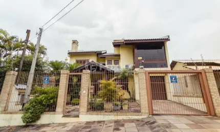 Casa com 4 quartos à venda na Travessa Porto Príncipe, 59, Jardim Lindóia, Porto Alegre, 306 m2 por R$ 1.650.000