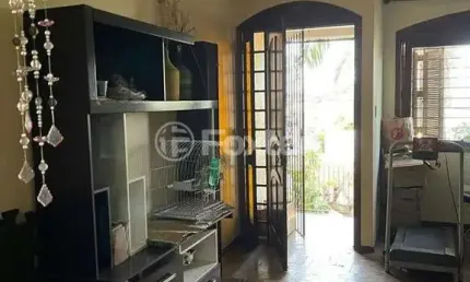 Casa com 3 quartos à venda na Rua Arnaldo Ballve, 685, Jardim Itu Sabará, Porto Alegre, 152 m2 por R$ 499.900