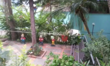 Casa com 4 quartos à venda na Rua Conde da Figueira, 667, Vila Jardim, Porto Alegre, 427 m2 por R$ 1.700.000
