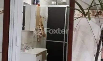 Casa com 3 quartos à venda na Rua Ariosto Vieira Rodrigues, 157, Santa Rosa de Lima, Porto Alegre, 180 m2 por R$ 265.000