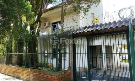 Casa com 3 quartos à venda na Rua Lauro Rodrigues, 590, Costa e Silva, Porto Alegre, 197 m2 por R$ 520.000