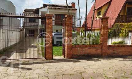 Casa com 7 quartos à venda na Rua General Telino Chagastelles, 75, Parque Santa Fé, Porto Alegre, 270 m2 por R$ 549.000