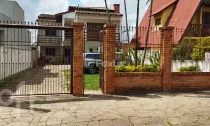 Casa com 7 quartos à venda na Rua General Telino Chagastelles, 75, Parque Santa Fé, Porto Alegre, 270 m2 por R$ 628.000
