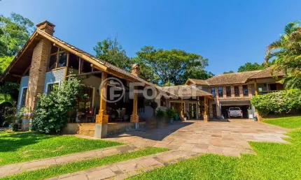 Casa com 3 quartos à venda na Estrada Costa Gama, 955, Hípica, Porto Alegre, 355 m2 por R$ 2.698.475