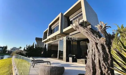 Casa em condomínio fechado com 6 quartos à venda na rua rio jacuí, 1331, centro, xangri-lá, 486 m2 por r$ 8.050.000