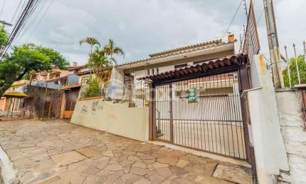 Casa comercial com 2 salas à venda na Avenida Nonoai, 1686, Nonoai, Porto Alegre, 358 m2 por R$ 800.000