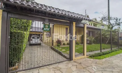 Casa com 3 quartos à venda na rua professor guerreiro lima, 585, partenon, porto alegre, 240 m2 por r$ 1.200.000