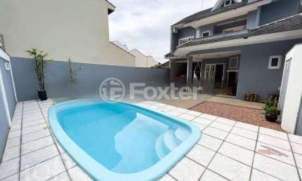 Casa com 4 quartos à venda na Rua San Marino, 628, Marechal Rondon, Canoas, 388 m2 por R$ 1.590.000