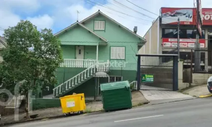 Casa com 3 quartos à venda na Rua Vinte de Setembro, 855, Nossa Senhora de Lourdes, Caxias do Sul, 562 m2 por R$ 1.200.000