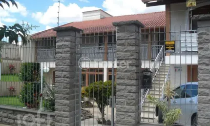 Casa com 4 quartos à venda na Avenida Farroupilha, 6251, Marechal Rondon, Canoas, 240 m2 por R$ 1.250.000