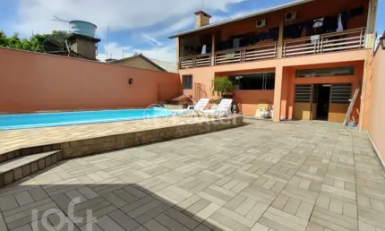 Casa com 3 quartos à venda na Rua América, 911, Canudos, Novo Hamburgo, 390 m2 por R$ 890.000