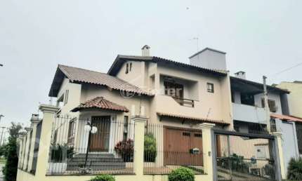 Casa com 3 quartos à venda na Rua Turquia, 18, Marechal Rondon, Canoas, 255 m2 por R$ 1.170.000