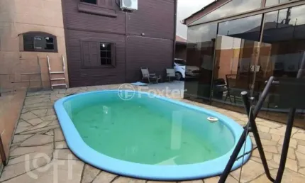Casa com 3 quartos à venda na Avenida Dona Rosalina, 1431, Igara, Canoas, 125 m2 por R$ 650.000