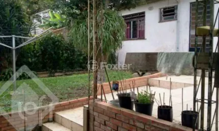 Casa com 5 quartos à venda na Avenida General Barreto Viana, 537, Chácara das Pedras, Porto Alegre, 283 m2 por R$ 950.000