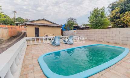 Casa com 3 quartos à venda na Rua Criciumal, 121, Cecília, Viamão, 116 m2 por R$ 400.000