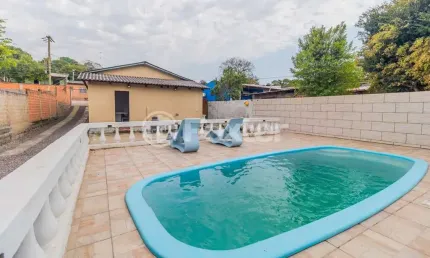 Casa com 3 quartos à venda na Rua Criciumal, 121, Cecília, Viamão, 116 m2 por R$ 400.000
