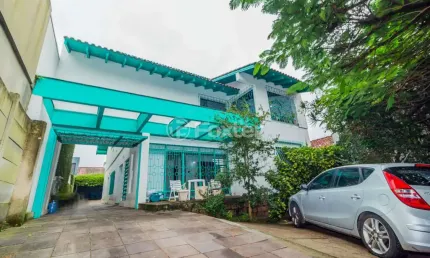 Casa com 5 quartos à venda na Rua Jacundá, 144, Guarujá, Porto Alegre, 400 m2 por R$ 798.000