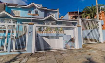 Casa com 5 quartos à venda na Rua Dona Adda Mascarenhas de Moraes, 1506, Jardim Itu Sabará, Porto Alegre, 269 m2 por R$ 1.358.500