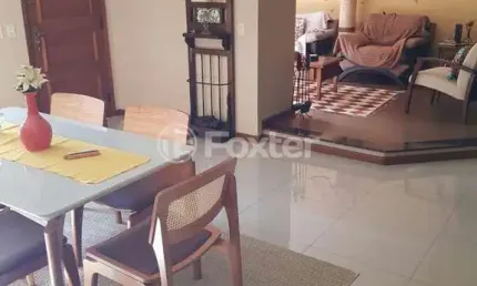 Casa em condomínio fechado com 3 quartos à venda na Avenida Vicente Monteggia, 2000, Cavalhada, Porto Alegre, 189 m2 por R$ 790.000