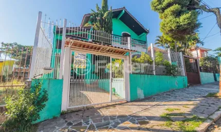Casa com 5 quartos à venda na Rua Ruy Carriconde, 50, Jardim Itu Sabará, Porto Alegre, 267 m2 por R$ 1.240.000