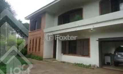 Casa com 5 quartos à venda na Rua Santa Terezinha, 286, Nossa Senhora das Graças, Canoas, 372 m2 por R$ 750.000