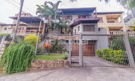 Casa com 6 quartos à venda na Rua Fernando Abbott, 1055, Cristo Redentor, Porto Alegre, 431 m2 por R$ 1.230.000