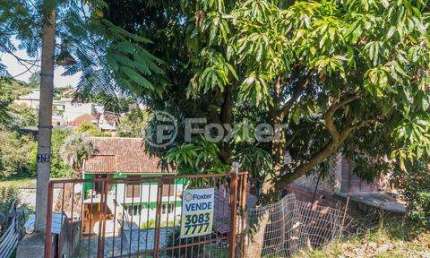 Casa com 5 quartos à venda na Rua das Camélias, 328, Bom Jesus, Porto Alegre, 251 m2 por R$ 480.000