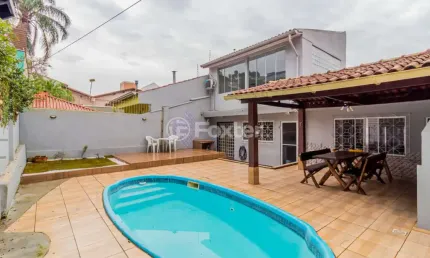 Casa com 3 quartos à venda na rua professor abílio azambuja, 82, jardim do salso, porto alegre, 207 m2 por r$ 849.900