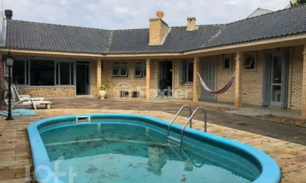 Casa com 5 quartos à venda na rua bagé, 623, niterói, canoas, 235 m2 por r$ 1.250.000