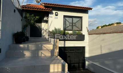 Casa com 4 quartos à venda na Rua Victor Silva, 224, Camaquã, Porto Alegre, 375 m2 por R$ 890.000