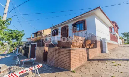 Casa com 3 quartos à venda na Avenida Delmar Rocha Barbosa, 792, Parque Santa Fé, Porto Alegre, 380 m2 por R$ 639.900