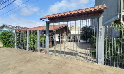 Casa com 4 quartos à venda na Avenida Senador Salgado Filho, 5581, Santo Onofre, Viamão, 217 m2 por R$ 521.500