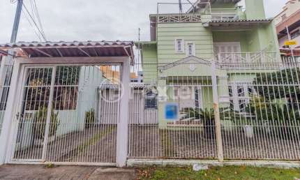 Casa com 5 quartos à venda na Rua Folha da Tarde, 49, Cristal, Porto Alegre, 330 m2 por R$ 1.790.000