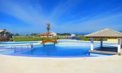 Casa em condomínio fechado com 3 quartos à venda na Rua Rio Camisas, 750, Centro, Xangri-Lá, 240 m2 por R$ 2.980.000