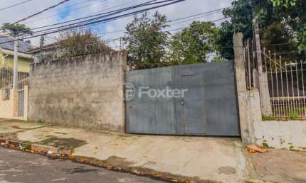 Terreno à venda na Rua João Bonuma, 102, Coronel Aparício Borges, Porto Alegre, 296 m2 por R$ 390.000