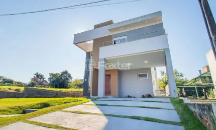 Casa em condomínio fechado com 3 quartos à venda na Rua Capororoca, 28, São Lucas, Viamão, 172 m2 por R$ 980.000