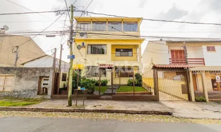Casa com 6 quartos à venda na Rua Monte Arraes, 232, Nonoai, Porto Alegre, 256 m2 por R$ 800.000