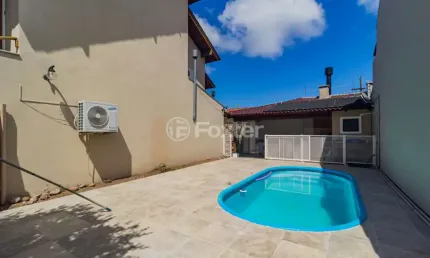 Casa com 3 quartos à venda na rua guatambu, 331, hípica, porto alegre, 210 m2 por r$ 1.045.000