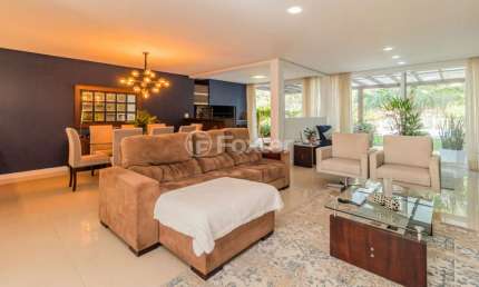 Casa em condomínio fechado com 4 quartos à venda na Avenida Juca Batista, 8000, Chapéu do Sol, Porto Alegre, 297 m2 por R$ 1.850.000