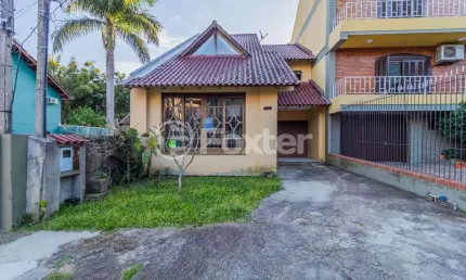 Casa em condomínio fechado com 3 quartos à venda na Avenida Vicente Monteggia, 1010, Cavalhada, Porto Alegre, 190 m2 por R$ 550.000