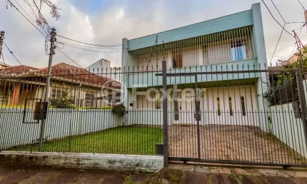 Casa comercial com 2 salas à venda na Rua Fagundes Varela, 83, Santo Antônio, Porto Alegre, 300 m2 por R$ 750.000