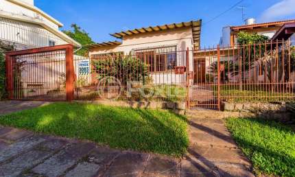 Casa com 3 quartos à venda na Rua Licínio Cardoso, 51, Chácara das Pedras, Porto Alegre, 181 m2 por R$ 790.000
