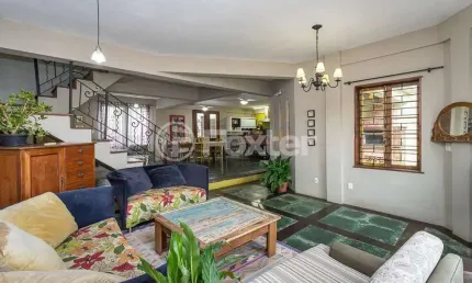 Casa com 3 quartos à venda na Rua Álvaro Nicofé, 195, Vila Jardim, Porto Alegre, 270 m2 por R$ 890.000