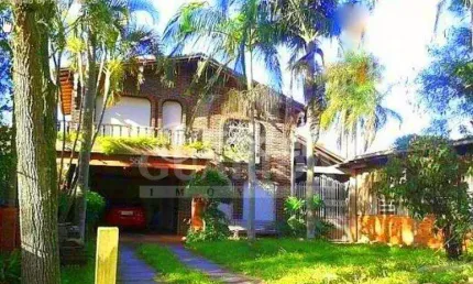 Casa com 3 quartos à venda na Estrada João Vedana, 561, Cavalhada, Porto Alegre, 200 m2 por R$ 905.000